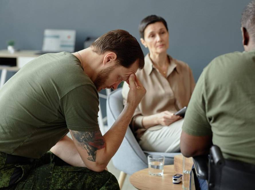depressed-soldier-resting-head-hands_236854-60864.jpg