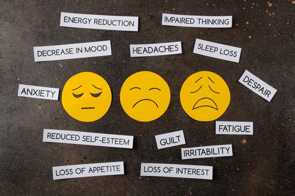 depression-concept-psychological-illness-sad-smiley-depression-symptoms-dark-background-top-view_262193-4635.jpg