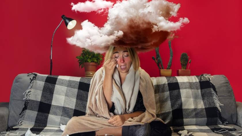 ill-young-girl-with-fever-cold-looks-suffering-feeling-sick-blue-snuffling-big-cloud-head-like-weight-feeling-ill-cold-virus-seasonal-grippe-woman-sitting-sofa-home_489646-5130.jpg