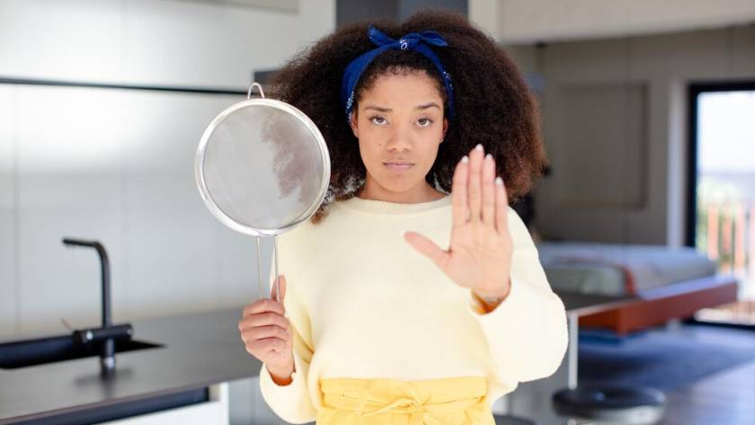 pretty-afro-black-woman-looking-serious-showing-open-palm-making-stop-gesture-home-chef-concept_1194-572711.jpg