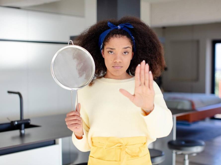 pretty-afro-black-woman-looking-serious-showing-open-palm-making-stop-gesture-home-chef-concept_1194-572711.jpg