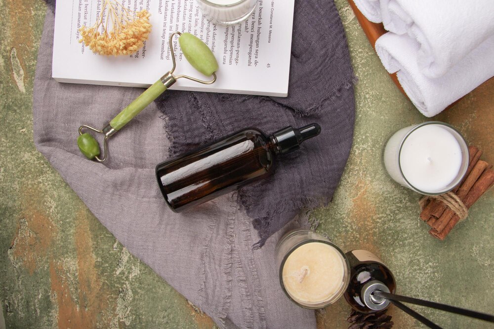 bottle-moisturizer-sits-blanket-book_1132956-2618.jpg